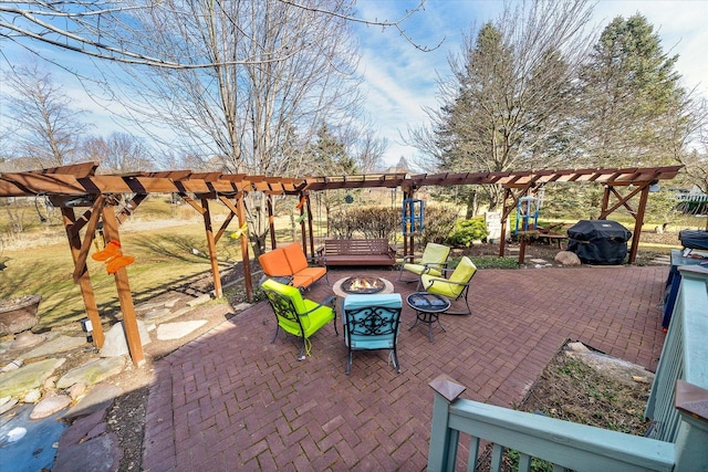 view of patio / terrace featuring a fire pit, a pergola, and a grill