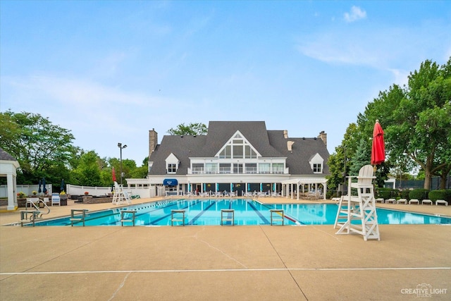 view of swimming pool featuring a patio