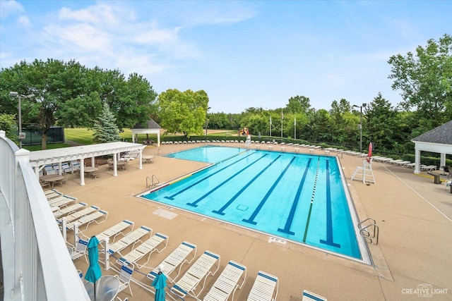 view of swimming pool featuring a patio and a gazebo