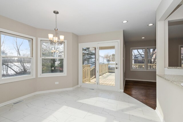 unfurnished dining area featuring recessed lighting, marble finish floor, visible vents, and baseboards