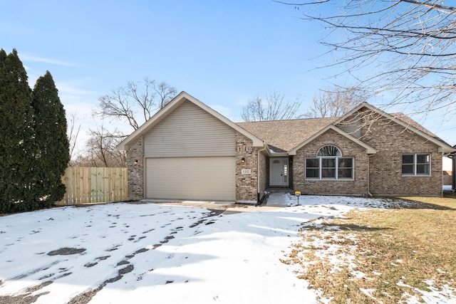 single story home with a garage