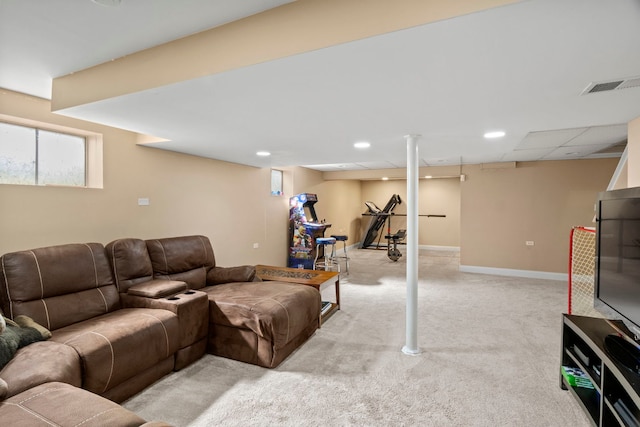 living room featuring recessed lighting, light colored carpet, visible vents, and baseboards