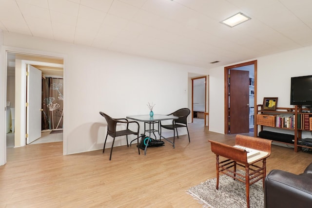 living room featuring light wood-style flooring