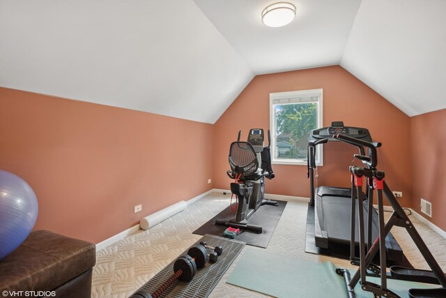 carpeted bedroom featuring lofted ceiling and ceiling fan