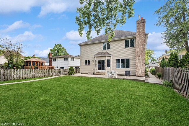 view of yard with a garage and an outdoor structure