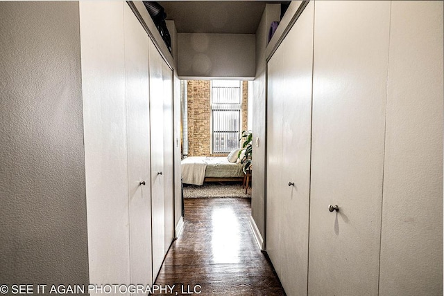 hall featuring dark wood-style floors