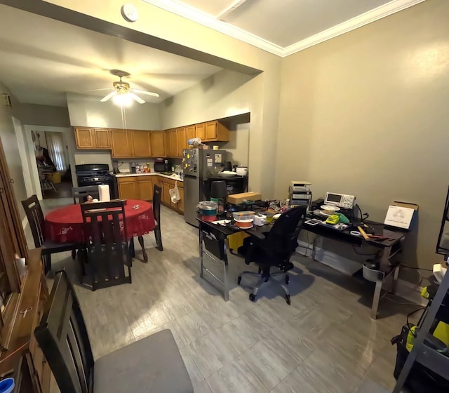 dining area with ceiling fan and ornamental molding