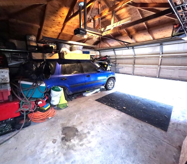 garage featuring a garage door opener