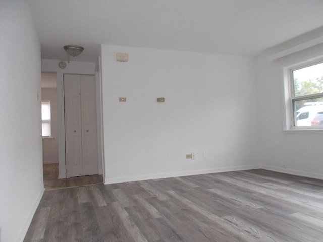 spare room featuring hardwood / wood-style floors