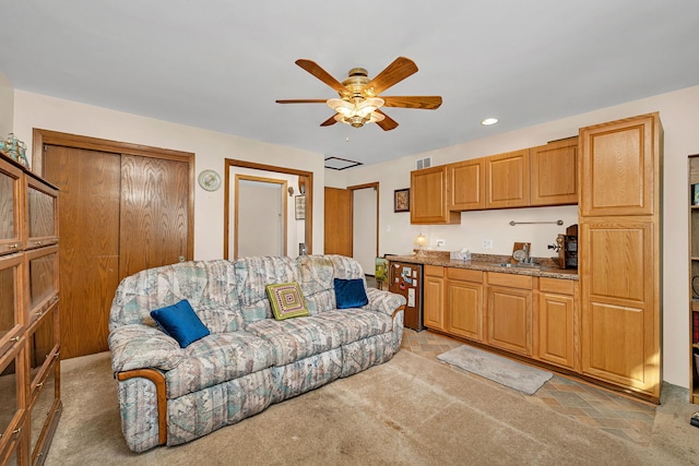 living room with ceiling fan