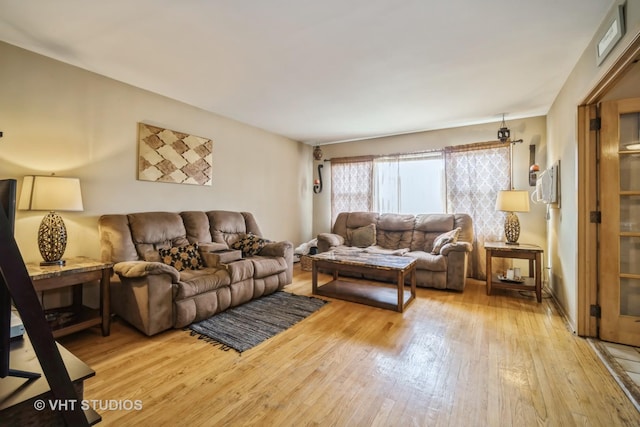 living area with light wood finished floors