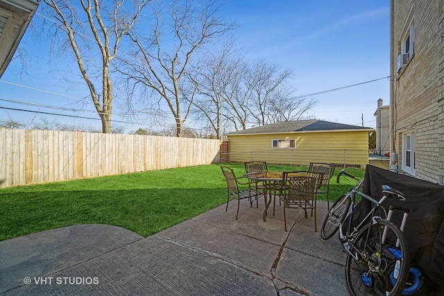 view of patio / terrace featuring outdoor dining area and a fenced backyard