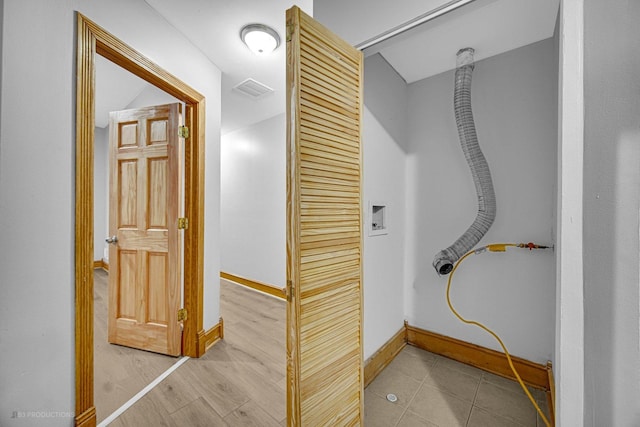 bathroom with wood-type flooring