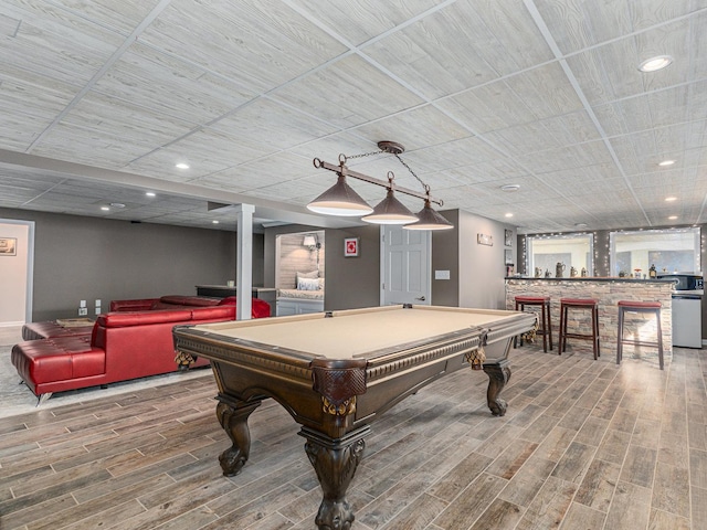 game room featuring wood finish floors, billiards, a dry bar, and recessed lighting