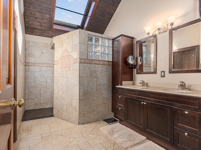 full bathroom with double vanity, walk in shower, and a sink