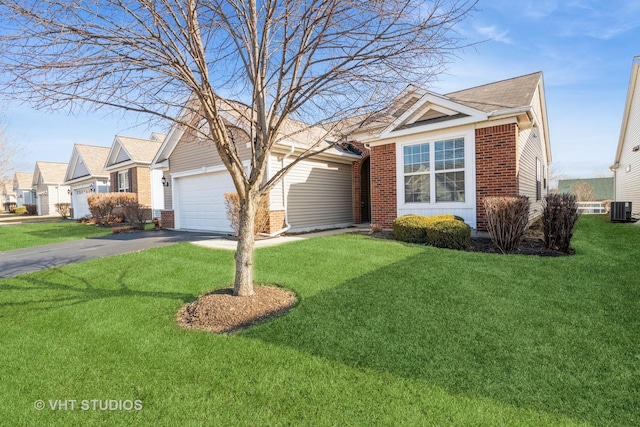 view of front of house featuring cooling unit and a front lawn