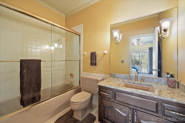 bathroom featuring shower / bath combination with glass door, crown molding, vanity, and toilet