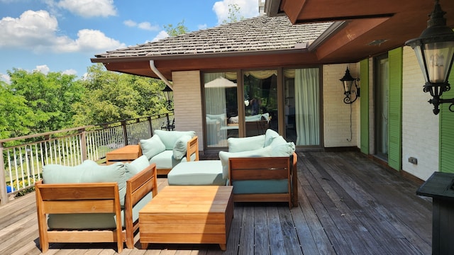 deck featuring outdoor lounge area