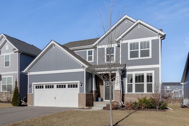 craftsman inspired home with a front lawn