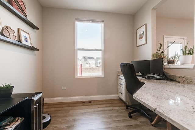 office space featuring light hardwood / wood-style flooring