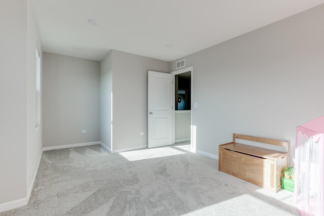 unfurnished bedroom with light carpet