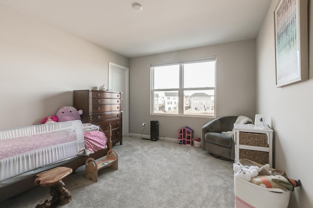 bedroom featuring carpet