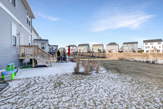 view of yard covered in snow