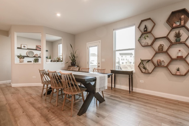 dining room featuring light hardwood / wood-style flooring