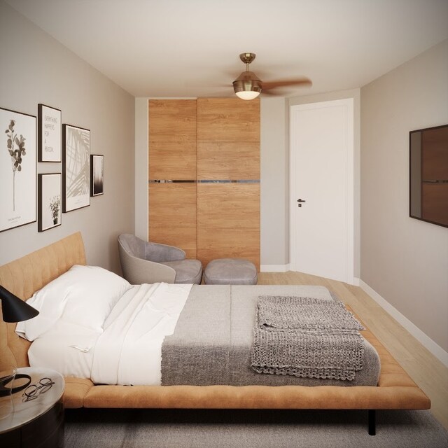 bedroom featuring hardwood / wood-style floors