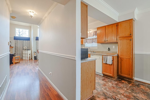 kitchen with crown molding, dark hardwood / wood-style floors, and dishwasher