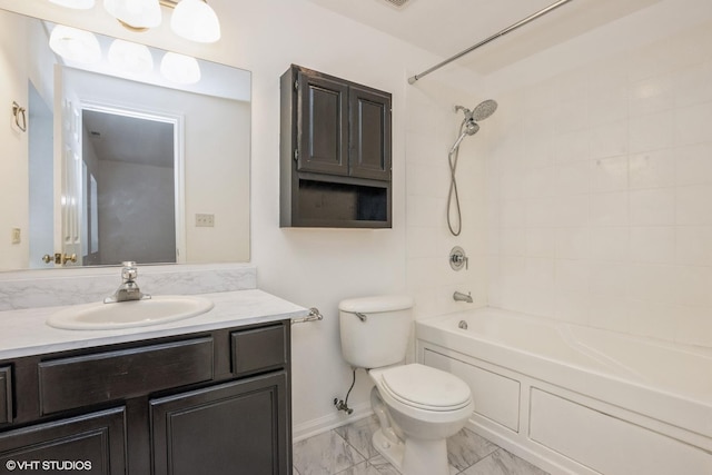 full bathroom featuring vanity, toilet, and tiled shower / bath combo