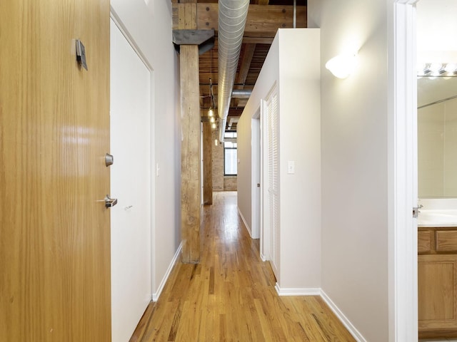 corridor featuring light wood-type flooring