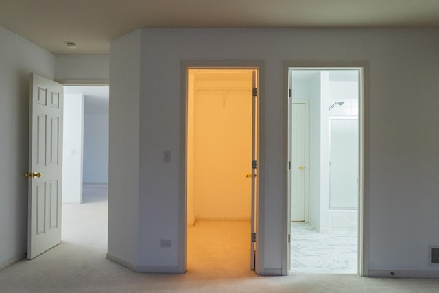 interior space featuring light colored carpet