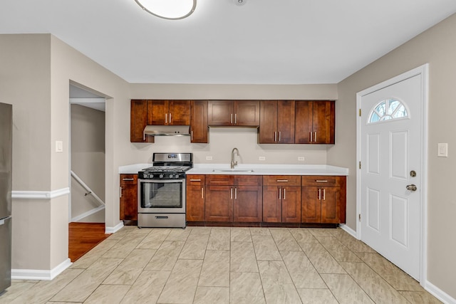 kitchen featuring stainless steel appliances and sink