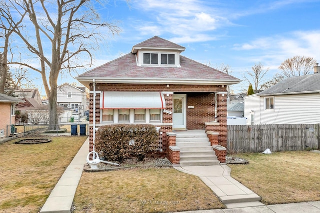 view of front of property with a front lawn