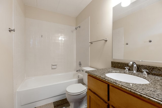 full bathroom with tiled shower / bath combo, vanity, and toilet