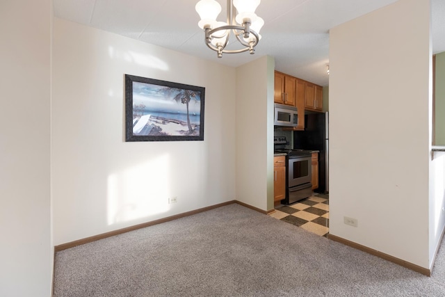 kitchen with an inviting chandelier, stainless steel appliances, light carpet, and pendant lighting