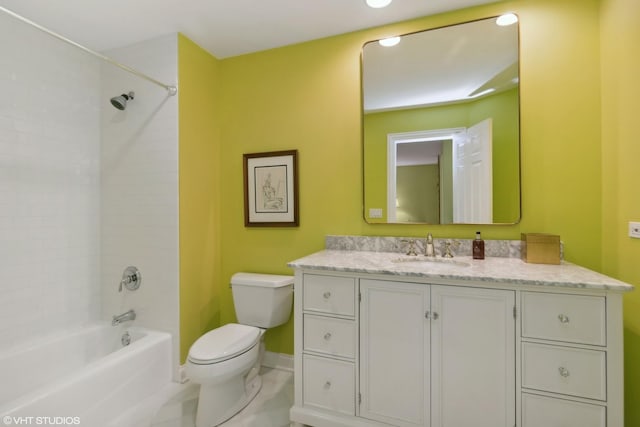 full bathroom with vanity, toilet, and tiled shower / bath combo