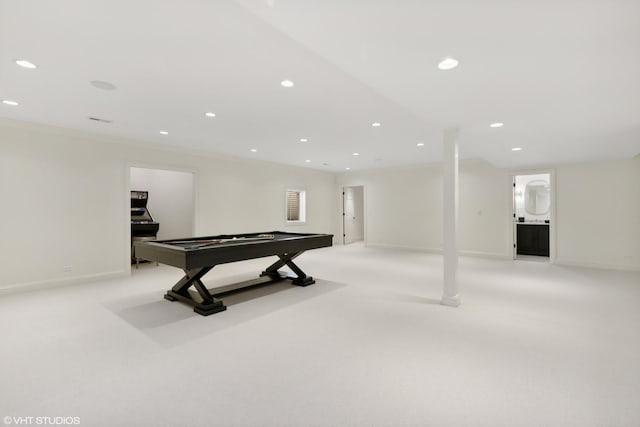 game room featuring pool table, ornamental molding, and light colored carpet