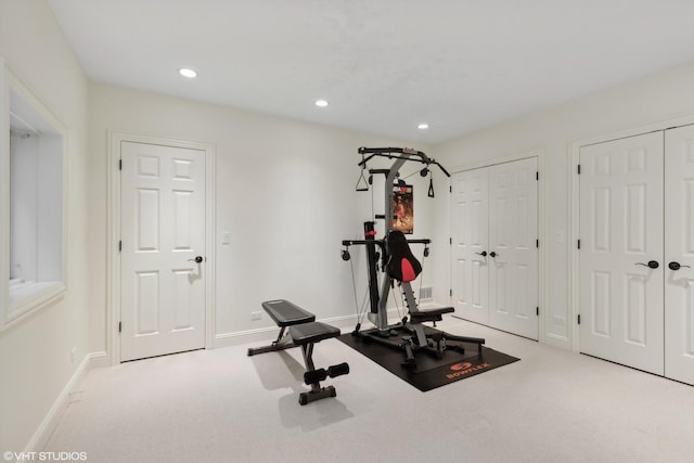 workout area with light carpet