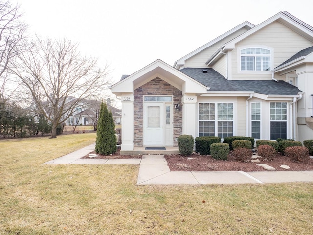 view of front of home with a front yard