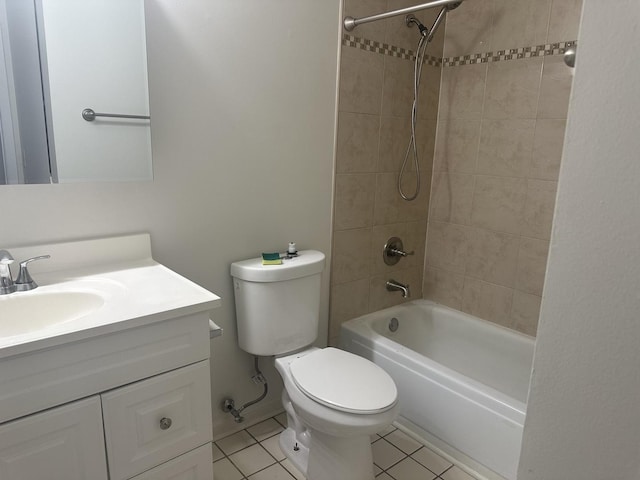 bathroom featuring tile patterned flooring, shower / bathing tub combination, vanity, and toilet