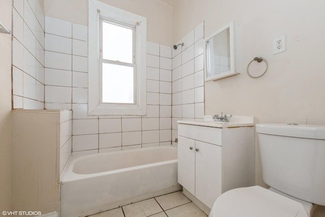 full bathroom featuring tile patterned flooring, vanity, toilet, and bathing tub / shower combination