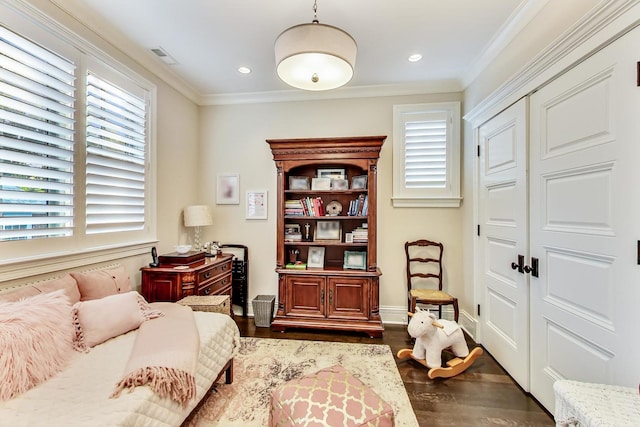 sitting room with ornamental molding, dark wood-style flooring, recessed lighting, and baseboards