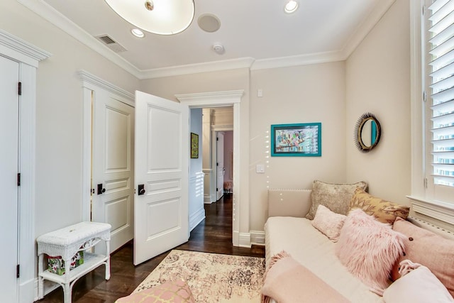 interior space featuring recessed lighting, visible vents, baseboards, dark wood finished floors, and crown molding