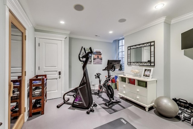 workout room featuring recessed lighting and crown molding