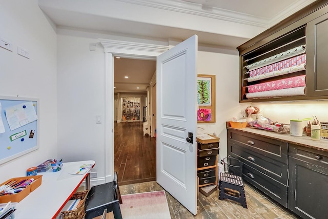 interior space featuring ornamental molding, wood finish floors, and recessed lighting