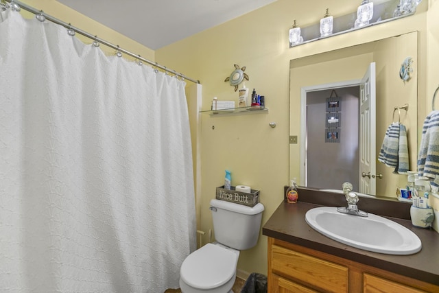 full bathroom with vanity and toilet