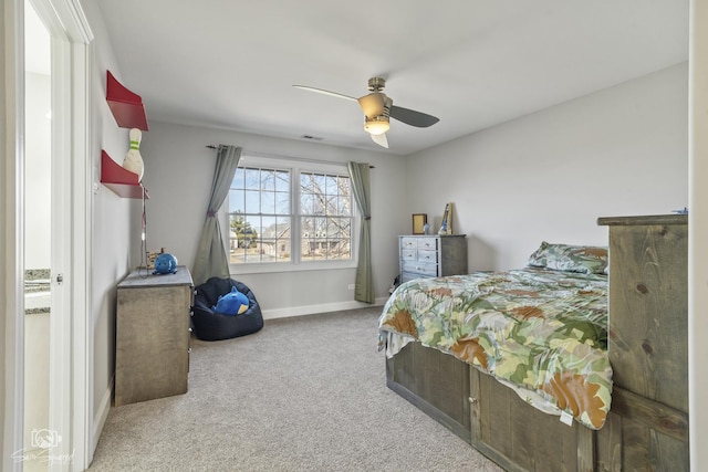 bedroom featuring ceiling fan, carpet, and baseboards