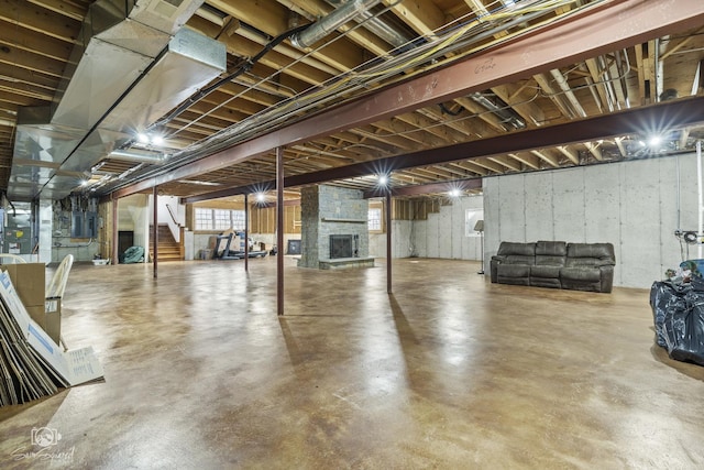 basement featuring a fireplace